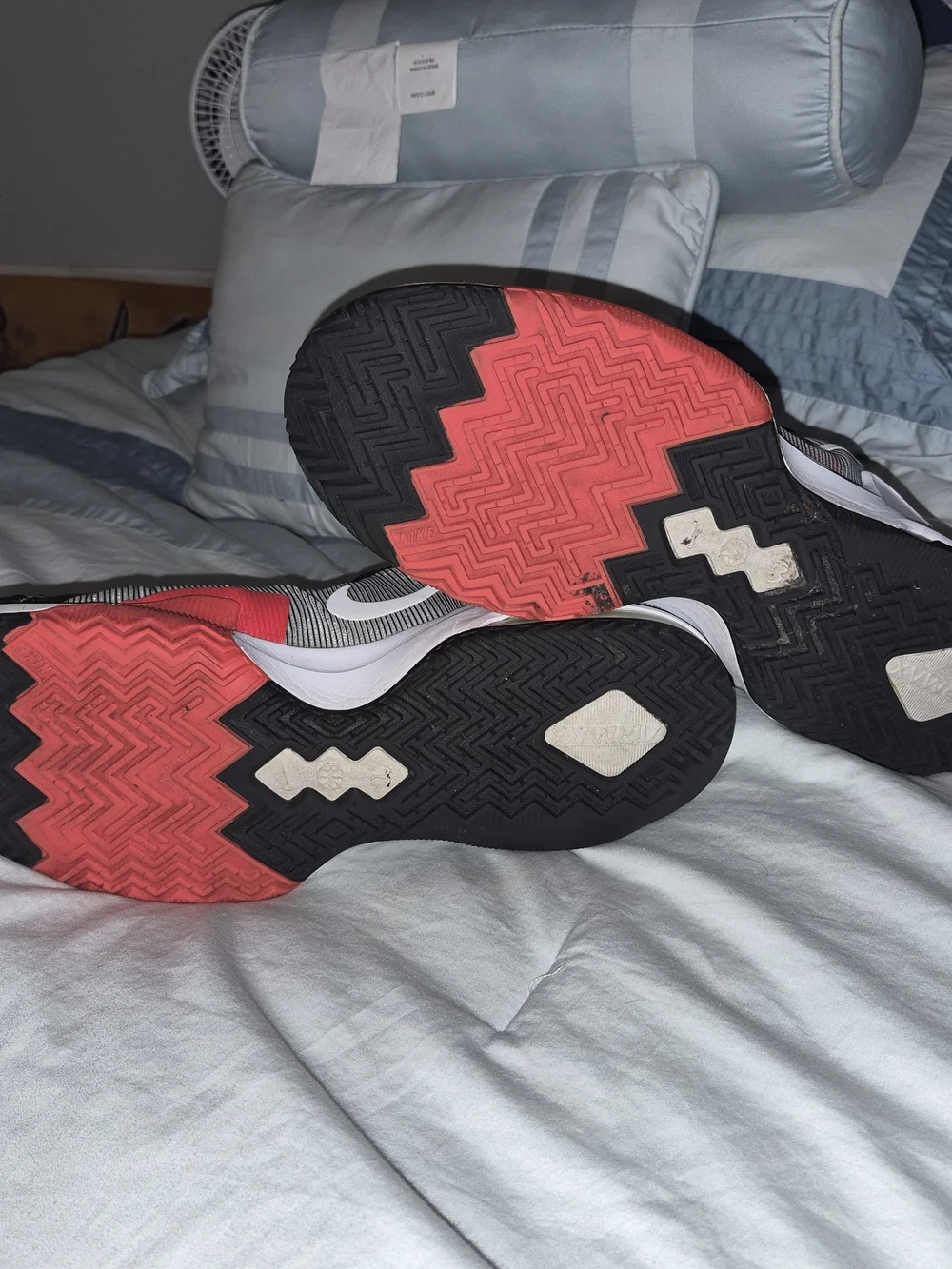 Nike Air Max Impact 4 'Black Bright Crimson' featuring a striped grey and bl